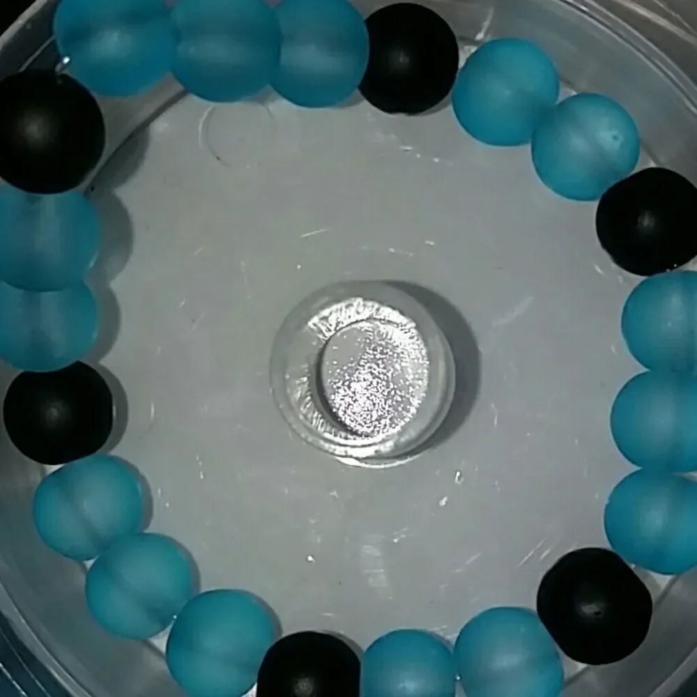 Baby blue and black beaded bracelet